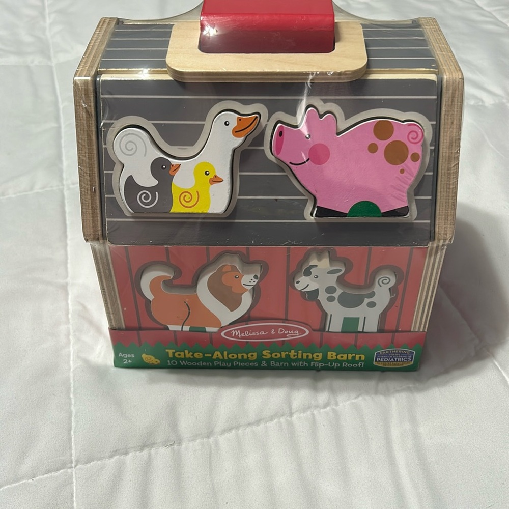 Kids Melissa & Doug take a long sorting barn